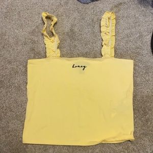 Yellow Crop top says “Honey”